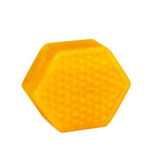 Unverpackte, gelbe Honigseife in Wabenform